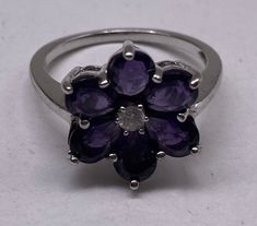 Beautiful Vintage 925 Sterling Silver Amethyst Flower Ring Size 7.25 good pre/owned condition. Purple Flower Ring, Amethyst Flower, Mini Milk, Round Solitaire, Purple Flower, Flower Ring, Tennis Bracelet, Ring Size 7, Sterling Silber