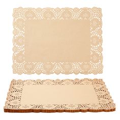 two pieces of paper with lacy doily on them, one in beige and the other in white