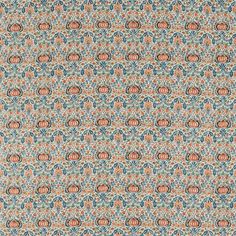 an orange and blue pattern on fabric