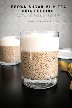 two glasses filled with chia pudding on top of a table