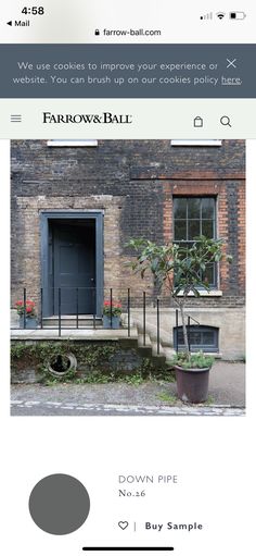 the front page of a website with an image of a brick building and potted plants