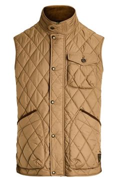 "Find RALPH LAUREN Beaton Quilted Vest on Editorialist. The between-season looks far more polished with a low-profile quilted vest popped with plenty of pocket space and shaped with snapped tabs at the waist. 27 1/2\" length (size Medium) Front zip closure with snap storm placket Stand collar Chest button-flap patch pocket; front patch pocket Adjustable snap side tabs Lined, with 96% recycled polyester, 4% polyester fill 100% recycled polyester Machine wash, tumble dry Imported" Classic Sleeveless Outerwear For Outdoor, Sleeveless Outerwear With Patch Pockets For Fall, Sleeveless Fall Outerwear With Patch Pockets, Classic Winter Vest With Snap Buttons, Quilted Sleeveless Vest For Workwear, Quilted Sleeveless Workwear Vest, Polo Vest, Honey Brown, Quilted Vest