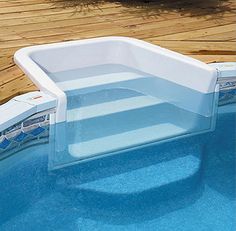 an above ground swimming pool is shown with the bottom section partially submerged in clear water