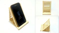 a cell phone sitting on top of a wooden stand