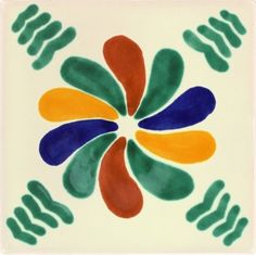 a white tile with multicolored designs on it