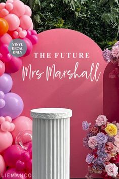 the future mrs marshall sign is surrounded by balloons and flowers in front of a pink backdrop