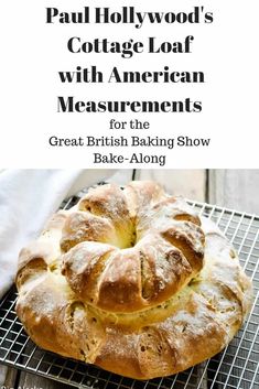 a loaf of bread sitting on top of a cooling rack with the words paul hollywood's cottage loaf with american measurements for the great british baking show bake - along