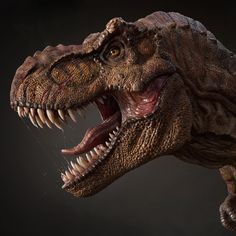 a close up of a dinosaur with its mouth open and it's teeth wide open