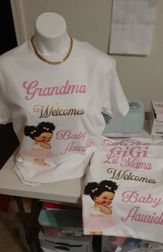 two t - shirts with the names of baby showerers and grandmas on them