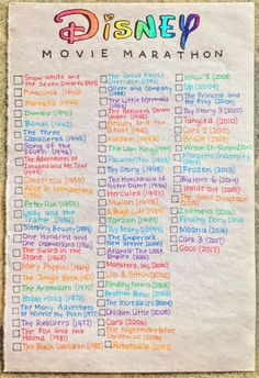 the disney movie marathon is shown on top of a piece of paper with colorful writing