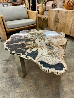 a wooden table sitting on top of a cement floor