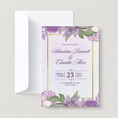 an elegant wedding card with purple flowers on the front and bottom, in gold foil