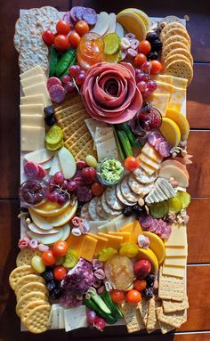 an art piece made out of cheese and fruits