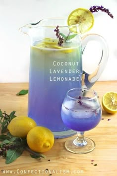 a pitcher of lavender lemonade next to some lemons