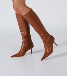 Introducing Shaq. Featuring a slender stiletto heel and pointed toe, this knee-high boot is bound to become your go-to this season and beyond. -Material: Leather -Sole: Rubber -Fit: True To Size -Toe-shape: Point -Features: Stiletto Heel -Heel: 8cm Leg Height x Calf Circumference x Opening Circumference 5 - 372mm x 348mm x 358mm 5.5 - 376.5mm x 353.5mm x 363.5mm 6 - 381mm x 359mm x 369mm 6.5 - 385.5mm x 364.5mm x 374.5mm 7 - 390mm x 370mm x 380mm 7.5 - 394.5mm x 375.5mm x 385.5mm 8 - 399mm x 381 Fall Heels, Embellished Heels, Bridal Heels, Stylish Boots