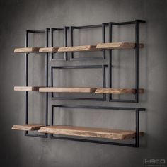 the shelves are made out of metal and wood, with wooden planks on each shelf