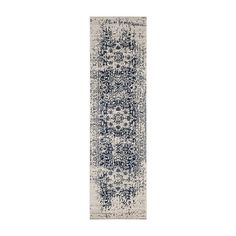 a white and blue runner rug on a white background