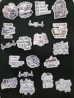 various stickers are on the back of a black bag with white writing and pictures