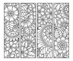 a set of stained glass panels with flowers and leaves on them, in black and white