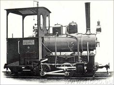 an old black and white photo of a train engine