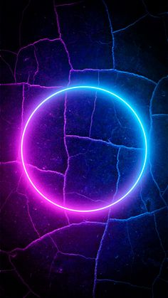 a neon circle is shown in the middle of a dark background with cracked, cracky surface