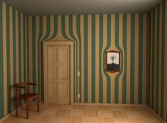 an empty room with green and white striped walls