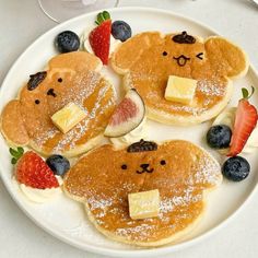 pancakes with fruit and teddy bears on them