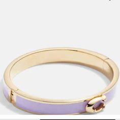 Women's Purple Coach Bracelet Modern Coach Jewelry For Formal Occasions, Coach Adjustable Bangle, Adjustable Coach Bangle, Coach Metal Bracelet Jewelry, Coach Metal Bangle Jewelry, Coach Bracelets As Gift, Chic Gold Coach Bracelets, Coach Formal Bracelet Jewelry, Chic Gold Coach Bracelet