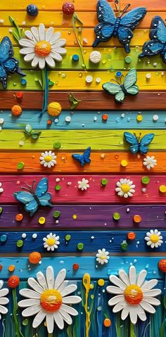 a colorful wall with flowers and butterflies painted on it