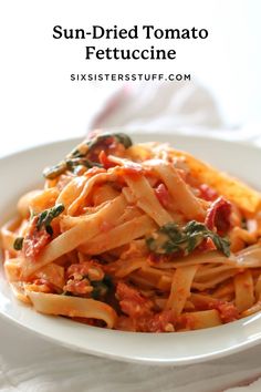 sun dried tomato fettuccine in a white bowl