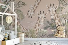 two giraffes are standing in the jungle wallpapered children's room