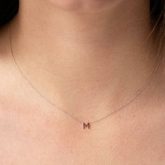 This refined white gold letter M necklace is the perfect personalised gift! Featuring a single letter initial M pendant on a classic white gold chain. Chain length: 38-43cm (adjustable)Chain thickness: 0.7mmLetter Size: 4.5mm x 5mmMaterial: 9k White Gold K Necklace, J Necklace, Initial M, M Necklace, Diamond Initial Necklace, White Gold Chain, Wooden Wardrobe, Sketches Dresses, Single Letter