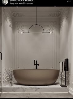 a bathroom with a large bathtub and cross on the wall