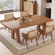 a large wooden table with chairs around it