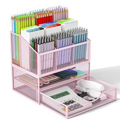 a pink desk organizer with lots of pens and pencils