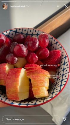 a bowl filled with sliced up fruit on top of a table