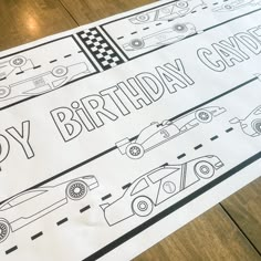 a sheet of paper with cars on it and the words happy birthday given to them