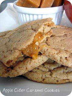 three cookies stacked on top of each other with caramel toppings in the middle