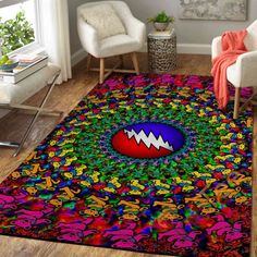 a colorful area rug with an image of a monster in the center and letters all over it