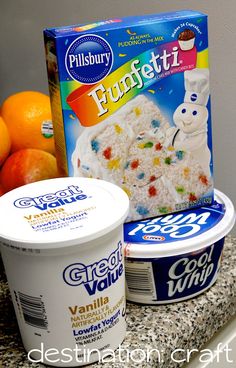 an ice cream and yogurt are sitting on a counter