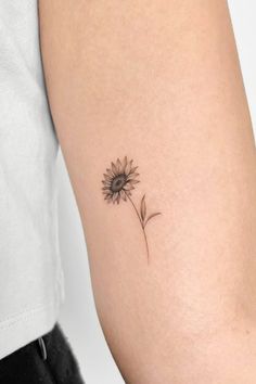 17 Best Small Sunflower Tattoo Designs That Will Make You Ecstatic Small Sunflower Hand Tattoo, Floral Pelvis Tattoo, Sunflower Tattoo Tiny, Simple Tattoos Sunflower, Small Fine Tattoos, Minimalist Sunflower Tattoo Simple, Small Tattoos Sunflower, Tiny Sunflower Tattoo Simple, Sunflower Small Tattoo