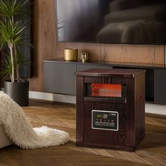 a living room with a television and fireplace