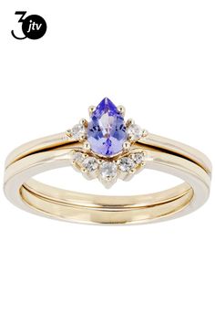 0.34ct Pear Shape Tanzanite with 0.11ctw Round White Zircon 18k Yellow Gold Over Sterling Silver Set of 2 Rings. Measures Approximately 0.32"Lx0.30"W. Accent stones primarily zircon. Two Rings, 2 Rings, Blue Tanzanite, Pear Shape, Pear Shaped, Pear, 18k Gold, Yellow Gold, Sterling Silver