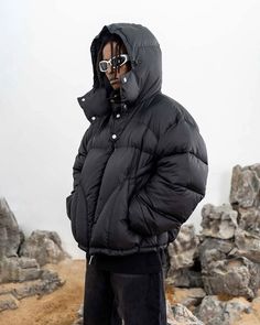 Discover unparalleled cold-weather chic with our stylish Black Hooded Puffer Jacket. Crafted for ultimate warmth and trendsetting style, this jacket blends fashion-forward design with practicality. Oversized Winter Coat, Oversized Puffer Jacket, High Street Shops, Streetwear Fits, Hooded Puffer Jacket, Oversized Streetwear, Fashion Cover, Black Puffer Jacket, Y2k Vibes