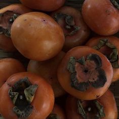 a pile of tomatoes that have been cut in half