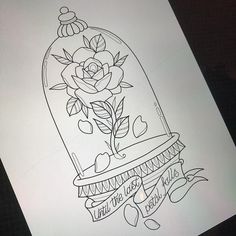 a drawing of a rose in a glass case with writing on the bottom and below it