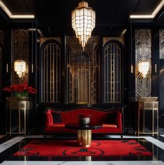 an elegant living room with black walls and gold trimmings, red couches and chandeliers