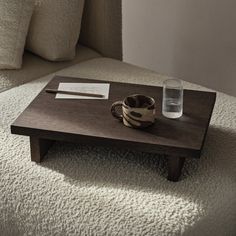 a coffee table with a cup on it