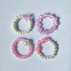 These beaded rings are so kawaii and slide comfortably onto your fingers! Each ring is made with cute, pink and pearly white beads tied together with elastic to stretch over most finger sizes. Small Bead Rings, Kawaii Rings, Kawaii Ring, So Kawaii, Elastic Rings, Beads Ring, Ring Inspo, Beaded Ring, Beads Bracelet Design