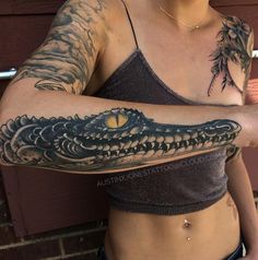 a woman with a tattoo on her arm